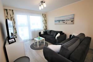 Część wypoczynkowa w obiekcie Apartament Superior Pastelowy Przy Plaży