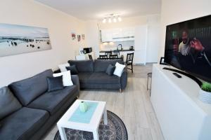 Telewizja i/lub zestaw kina domowego w obiekcie Apartament Superior Pastelowy Przy Plaży