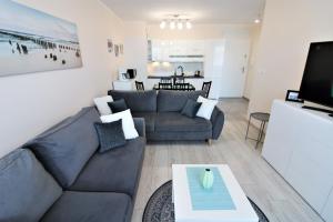 Telewizja i/lub zestaw kina domowego w obiekcie Apartament Superior Pastelowy Przy Plaży