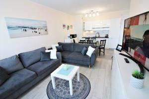Część wypoczynkowa w obiekcie Apartament Superior Pastelowy Przy Plaży