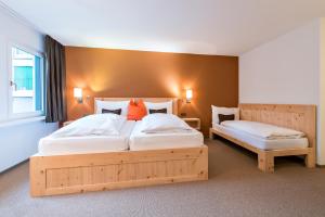 Łóżko lub łóżka w pokoju w obiekcie Hotel Donatz