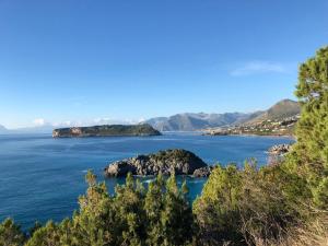 an island in the middle of a body of water at Me&Sea B&B in San Nicola Arcella