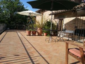 A patio or other outdoor area at B&B I Canonici