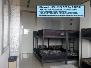 Voodi või voodid majutusasutuse Dominant Studio Hostel with Free Parking for Preregistered Drivers & Garage with CCTV toas