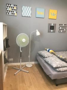 Posteľ alebo postele v izbe v ubytovaní Apartament SZTOKHOLM