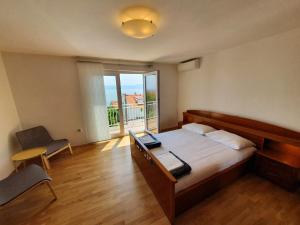 Postel nebo postele na pokoji v ubytování Apartment Bella Mare