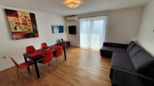 TV a/nebo společenská místnost v ubytování Apartment Bella Mare