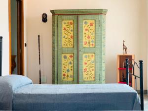 A bed or beds in a room at Ambrosia