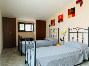 A bed or beds in a room at Ambrosia