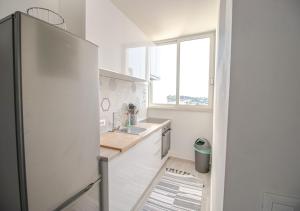 Kuchyň nebo kuchyňský kout v ubytování Lukas Central Apartment - Digital Nomads friendly
