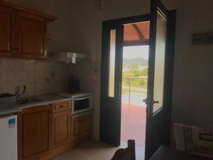 Kuchyň nebo kuchyňský kout v ubytování Theo Apartments + 25 fotografií