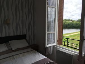 Postel nebo postele na pokoji v ubytování Bar Le Lac