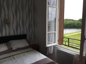 Postel nebo postele na pokoji v ubytování Bar Le Lac