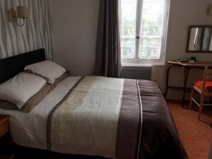 Postel nebo postele na pokoji v ubytování Bar Le Lac