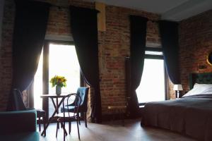 Posteľ alebo postele v izbe v ubytovaní Apartamenty Centrum RS SUITES Kowalska 12