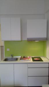 Kuchyň nebo kuchyňský kout v ubytování Autan des Couleurs