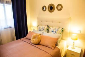 מיטה או מיטות בחדר ב-Apartment las sirenas WiFi 100 Mb