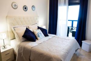 Posteľ alebo postele v izbe v ubytovaní Apartment las sirenas -WiFi 100 Mb-, Sea view