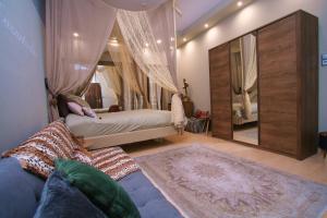 A bed or beds in a room at Flying Bed Ioannina in the center of the city