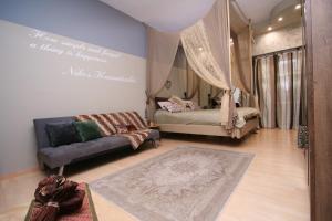 A bed or beds in a room at Flying Bed Ioannina in the center of the city