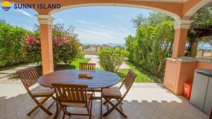a patio with a table and chairs on a patio at Villarios Castello in Villarios
