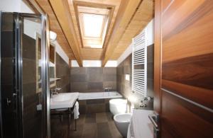 Kúpeľňa v ubytovaní Tassido Coda Resort + 37 fotografií