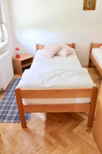 Postel nebo postele na pokoji v ubytování Artsy Apartment Zagreb