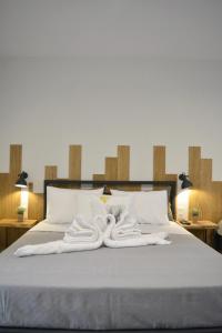 Кровать или кровати в номере ZOE _apartments_