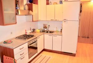 Kuchyň nebo kuchyňský kout v ubytování Artsy Apartment Zagreb + 6 fotografií
