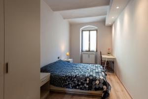 Ένα ή περισσότερα κρεβάτια σε δωμάτιο στο La casa dell’artista