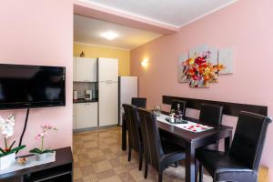 TV a/nebo společenská místnost v ubytování Apartment Medved