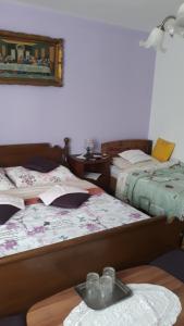 Ліжко або ліжка в номері Rooms "Dragica"