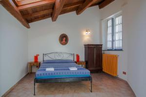 Postel nebo postele na pokoji v ubytování Agriturismo Casa Turchetti