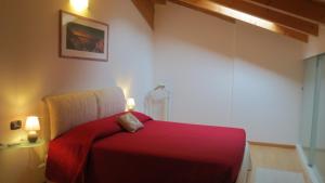Postel nebo postele na pokoji v ubytování Sweet Residence Tenno + 54 fotografií