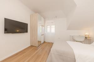 Postel nebo postele na pokoji v ubytování Enjoy Split, new apartment in the center with a private garden