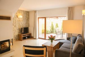 Posedenie v ubytovaní Pelikan Resort Dźwirzyno - Domki przy plaży