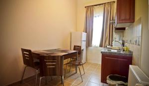 A kitchen or kitchenette at Spirit Apartman
