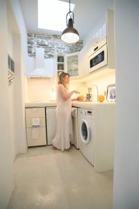 Kuchyňa alebo kuchynka v ubytovaní Lasia Boutique Apartment