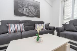 Posezení v ubytování Beautiful penthouse for 8 close to city center