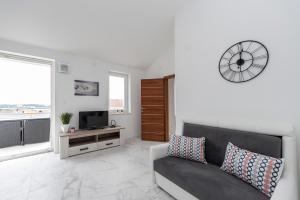 TV a/nebo společenská místnost v ubytování Beautiful penthouse for 8 close to city center