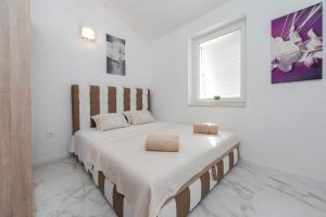 Postel nebo postele na pokoji v ubytování Beautiful penthouse for 8 close to city center