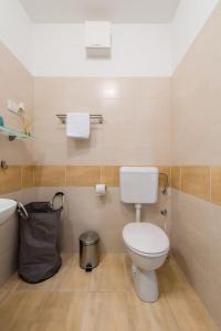 Kúpeľňa v ubytovaní Apartman "Bubi" + 19 fotografií