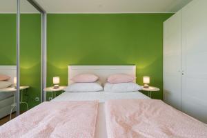 Posteľ alebo postele v izbe v ubytovaní Apartman "Bubi"