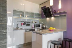 Kuchyňa alebo kuchynka v ubytovaní Apartman "Bubi"