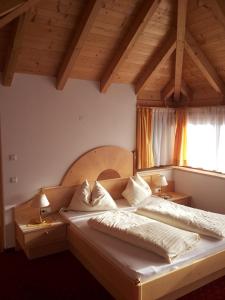 Postel nebo postele na pokoji v ubytování Hotel Laerchenhain
