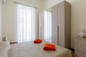 A bed or beds in a room at Casa Angelica