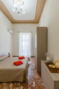 A bed or beds in a room at Casa Angelica