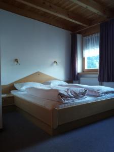 Postel nebo postele na pokoji v ubytování Hotel Laerchenhain