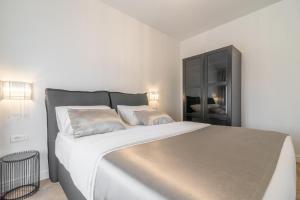 Posteľ alebo postele v izbe v ubytovaní Luxury Piano apartment