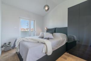 Postel nebo postele na pokoji v ubytování Luxury Piano apartment